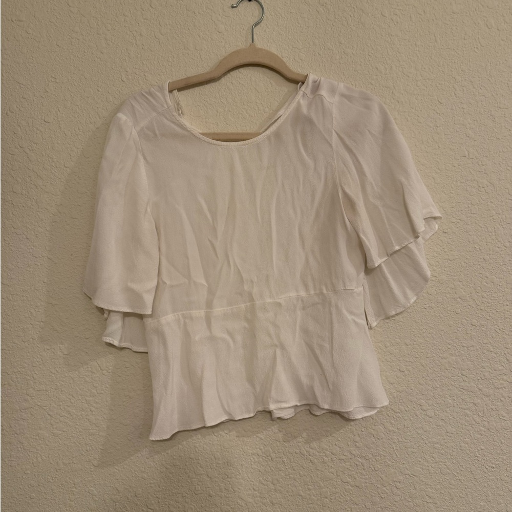 White flowy peplum top